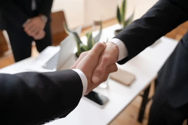 football contract negotiation meeting